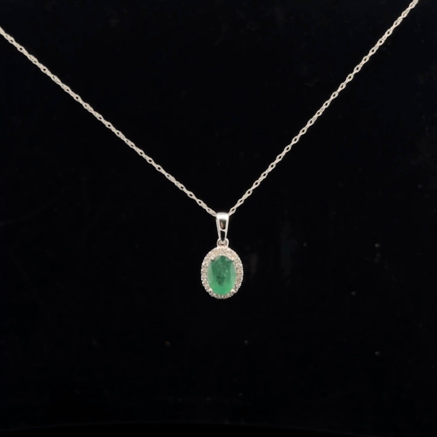 Oval Halo 1ct. 0.10ctw. - 10KW - Natural Emerald